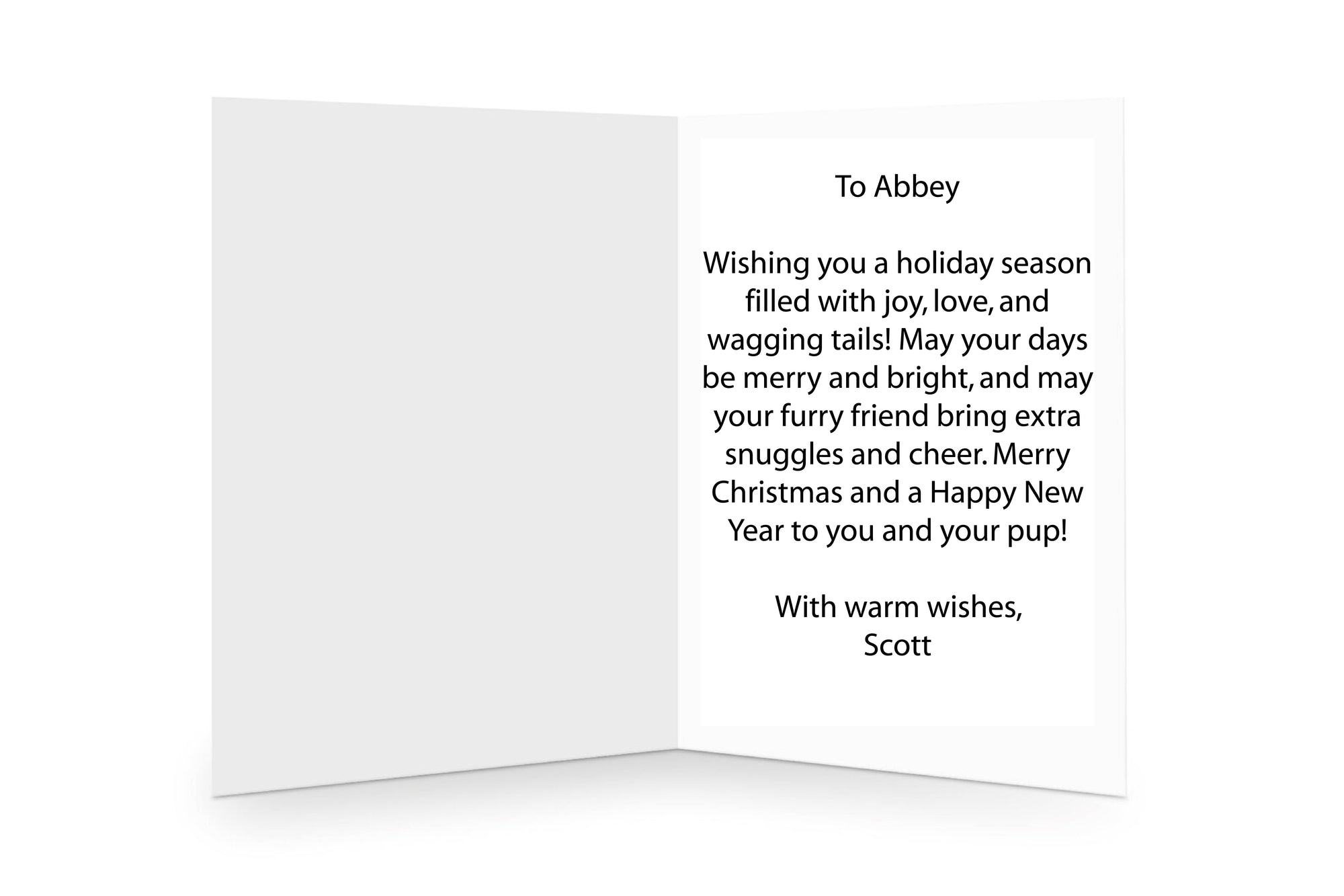 Personalised message inside a festive Christmas card, adding a heartfelt touch for dog lovers.