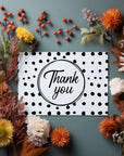 Charming 'Thank You' greetings card, perfect for offering a thoughtful message of appreciation.